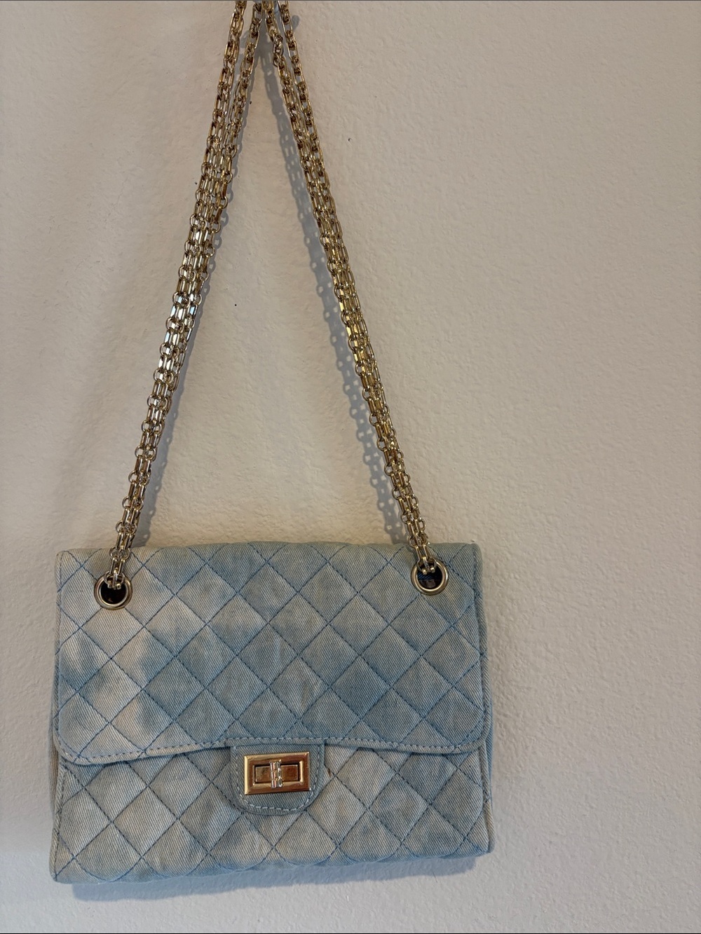 Light wash denim purse with gold tone hardware